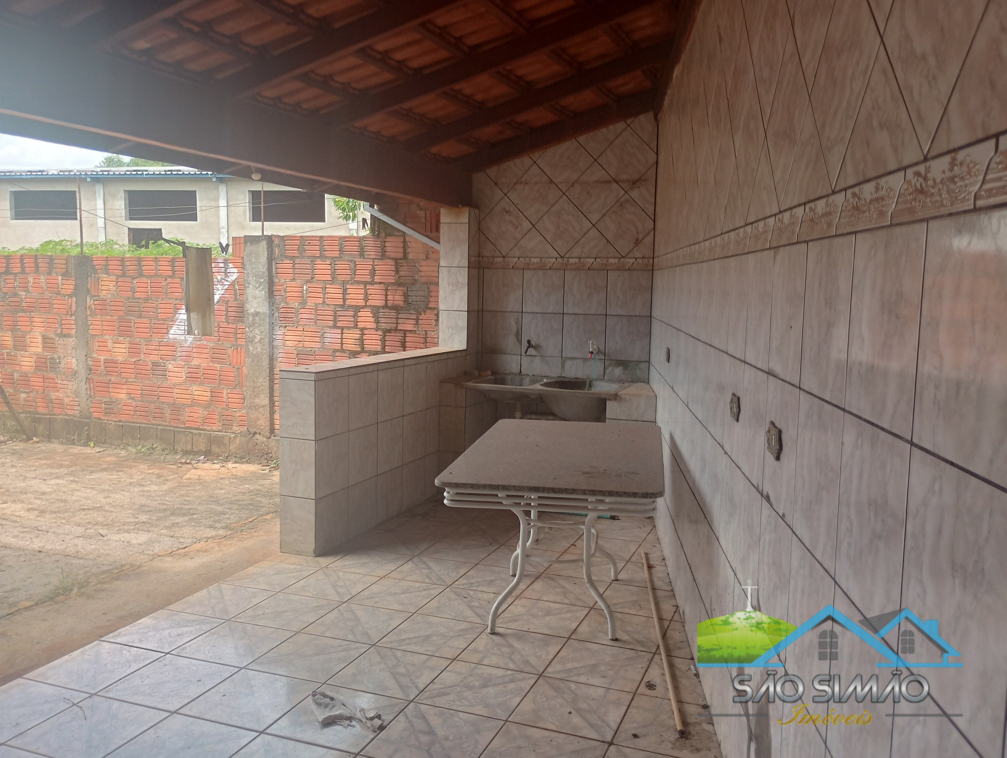 Casa com ponto comercial a venda em São Simão SP